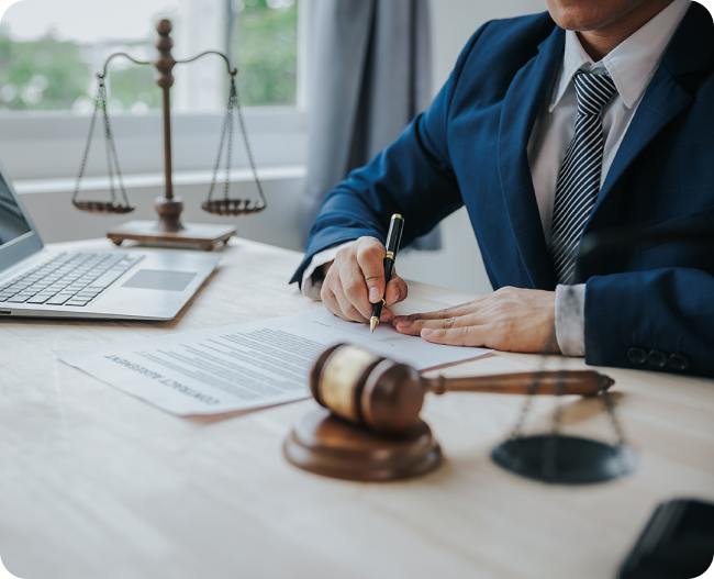 Man signing a legal document